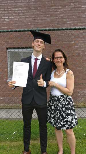 A picture of me and my mother at my graduation