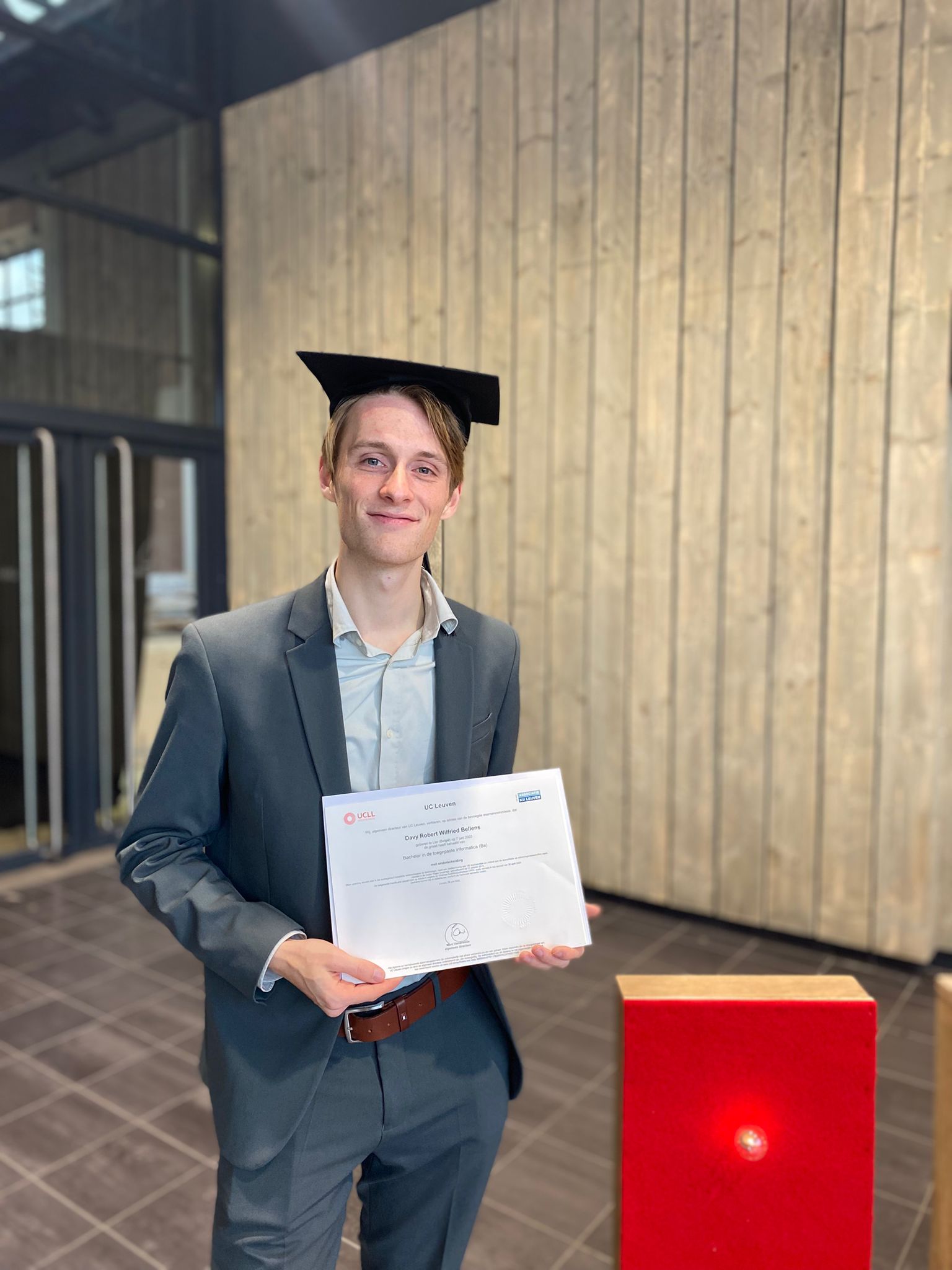 A picture of me throwing my academic cap into the air.