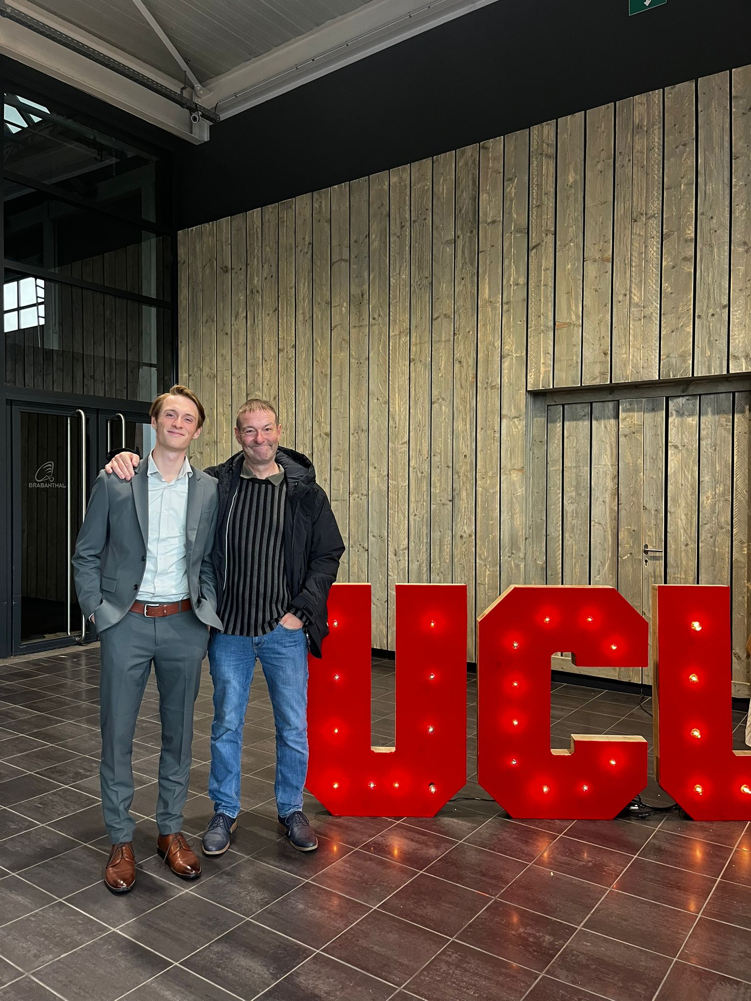 A picture of my father and me at my graduation.